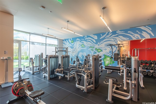 1001 Queen St Unit 2506, Honolulu, HI 96814 - gym featuring floor to ceiling windows and wallpapered walls