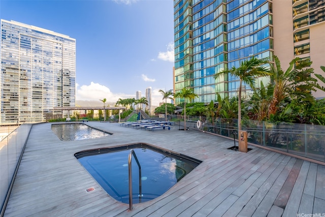 1001 Queen St Unit 2506, Honolulu, HI 96814 - community pool featuring a deck