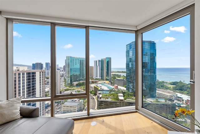 1001 Queen St Unit 2506, Honolulu, HI 96814 - sunroom / solarium featuring a view of city and a water view