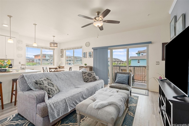 91-3633 Kauluakoko St Unit 412, Ewa Beach, HI 96706 - living area featuring light wood-type flooring and ceiling fan