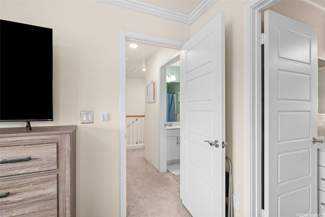 91-3633 Kauluakoko St Unit 412, Ewa Beach, HI 96706 - hall with light colored carpet, crown molding, and an upstairs landing