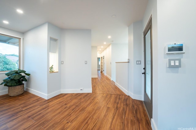 1207 Lilo Pl, Honolulu, HI 96822 - hallway with wood finished floors and recessed lighting