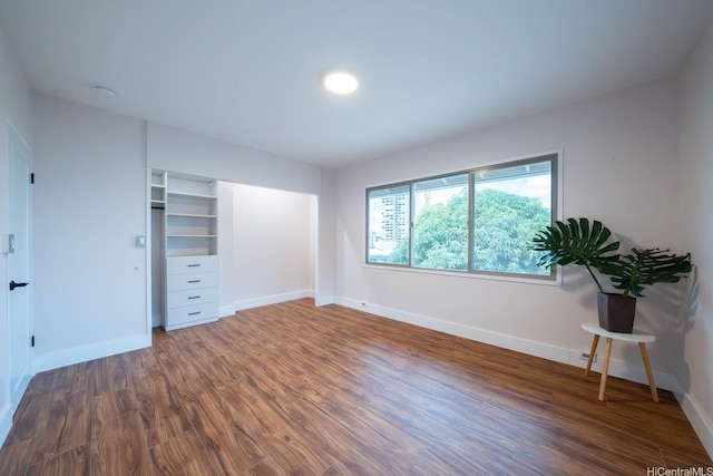 1207 Lilo Pl, Honolulu, HI 96822 - unfurnished bedroom with wood finished floors and a closet