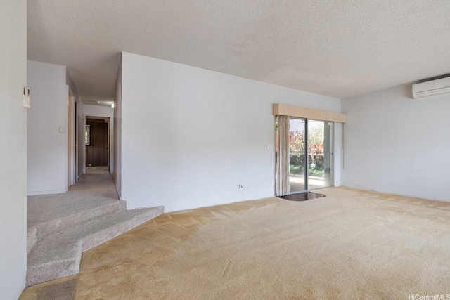 4722 Likini St, Honolulu, HI 96818 - unfurnished room featuring carpet floors, a wall unit AC, and a textured ceiling