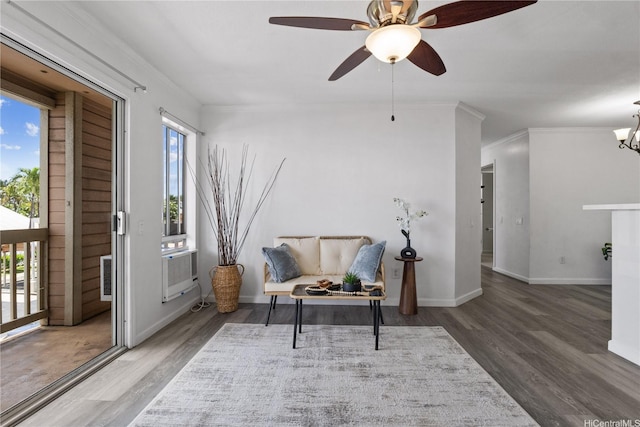 91-1213 Kaneana St Unit 12B, Ewa Beach, HI 96706 - sitting room with wood finished floors, a chandelier, ornamental molding, and a ceiling fan