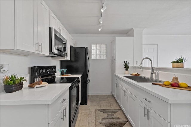 91-1213 Kaneana St Unit 12B, Ewa Beach, HI 96706 - kitchen featuring stainless steel microwave, black electric range, white cabinetry, light countertops, and ornamental molding
