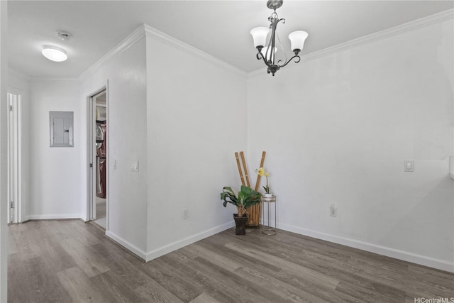 91-1213 Kaneana St Unit 12B, Ewa Beach, HI 96706 - unfurnished dining area featuring electric panel, wood finished floors, crown molding, and a chandelier