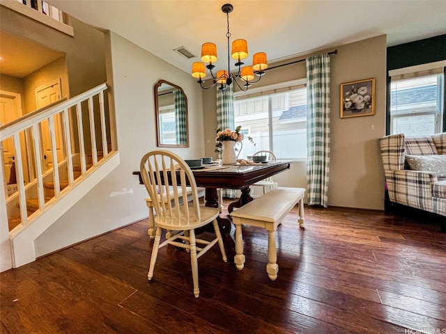 91-1356 Kaileolea Dr, Ewa Beach, HI 96706 - dining space featuring stairs, healthy amount of natural light, hardwood / wood-style floors, and a chandelier