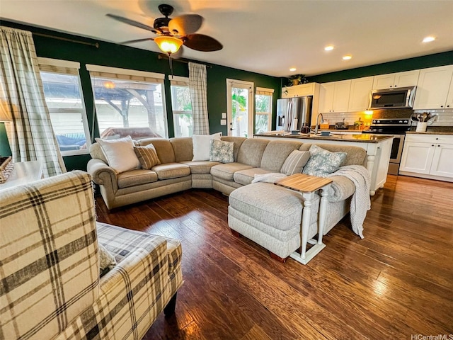 91-1356 Kaileolea Dr, Ewa Beach, HI 96706 - living area with a ceiling fan, dark wood-style flooring, and recessed lighting