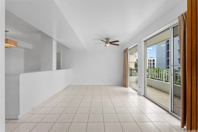 1425 Punahou St Unit 404, Honolulu, HI 96822 - spare room featuring a ceiling fan and light tile patterned floors