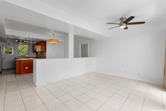 1425 Punahou St Unit 404, Honolulu, HI 96822 - unfurnished living room with ceiling fan and light tile patterned flooring