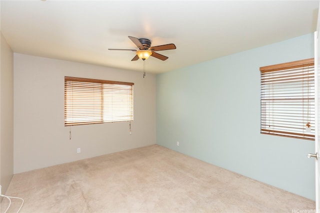91-1001 Keaunui Dr Unit 106, Ewa Beach, HI 96706 - empty room featuring carpet floors and a ceiling fan