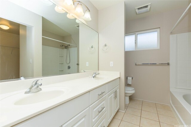 91-1001 Keaunui Dr Unit 106, Ewa Beach, HI 96706 - full bathroom with tile patterned floors, double vanity, and washtub / shower combination