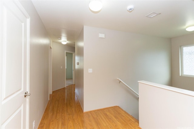 91-1001 Keaunui Dr Unit 106, Ewa Beach, HI 96706 - hall with an upstairs landing and light wood-style flooring