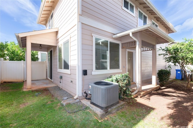 91-1001 Keaunui Dr Unit 106, Ewa Beach, HI 96706 - view of side of property featuring a central AC unit