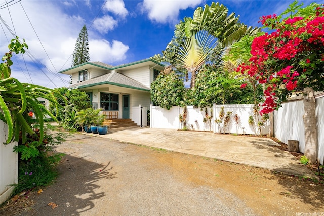 2633B Nahaku Pl Unit H, Honolulu, HI 96826 - view of front of house with a patio area