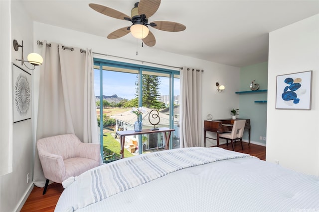 2633B Nahaku Pl Unit H, Honolulu, HI 96826 - bedroom with wood finished floors, access to outside, and a ceiling fan