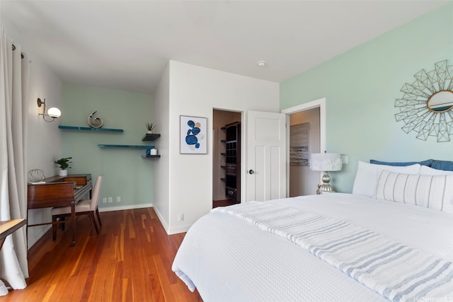 2633B Nahaku Pl Unit H, Honolulu, HI 96826 - bedroom with wood finished floors and a spacious closet