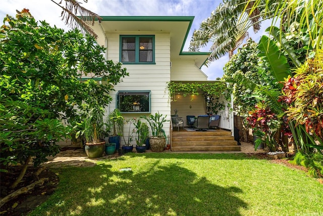 2633B Nahaku Pl Unit H, Honolulu, HI 96826 - rear view of house with a lawn