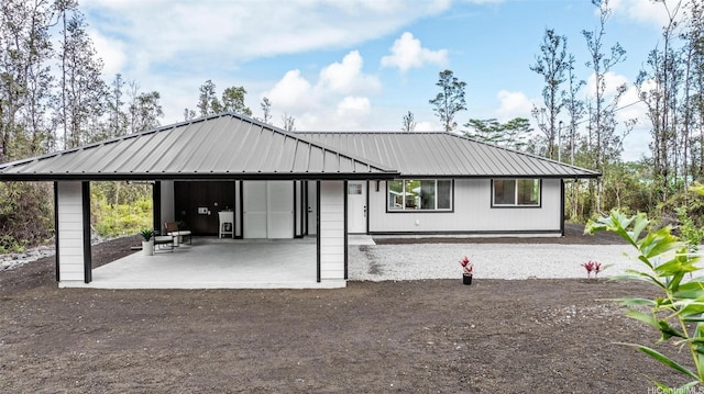 16-2073 Plumeria Dr, Pahoa, HI 96778 - view of front facade with a metal roof