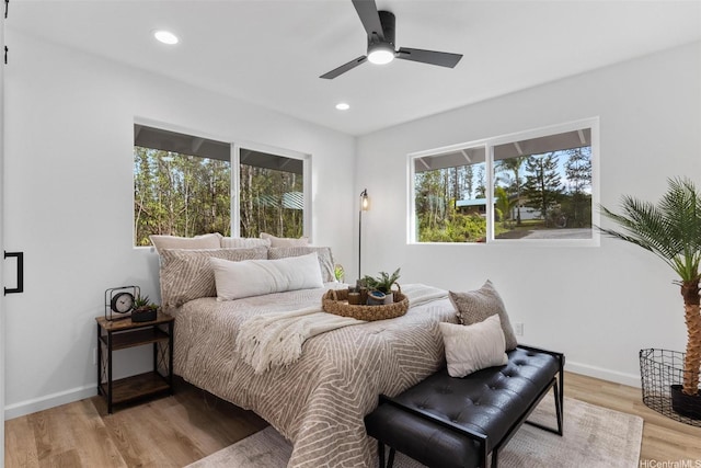 16-2073 Plumeria Dr, Pahoa, HI 96778 - bedroom with multiple windows, light wood finished floors, recessed lighting, and ceiling fan