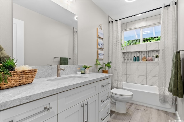 16-2154 Coral Dr, Pahoa, HI 96778 - bathroom featuring vanity, shower / bath combo with shower curtain, and wood finished floors