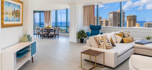 1888 Kalakaua Ave Unit 3504, Honolulu, HI 96815 - living area with wood finished floors, a city view, and a water view