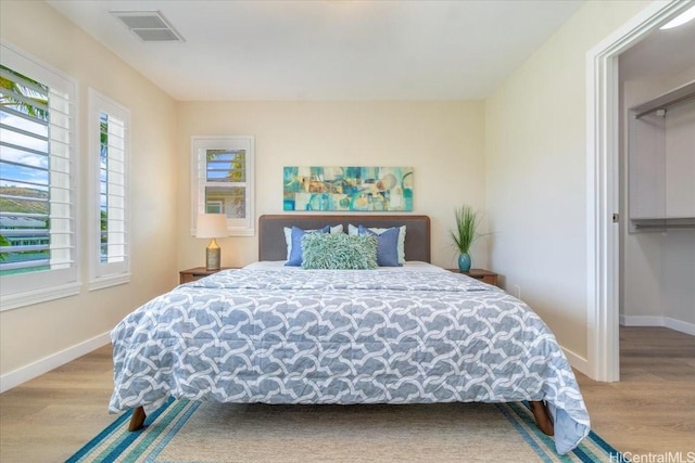 520 Lunalilo Home Rd Unit 354, Honolulu, HI 96825 - bedroom with wood finished floors and multiple windows