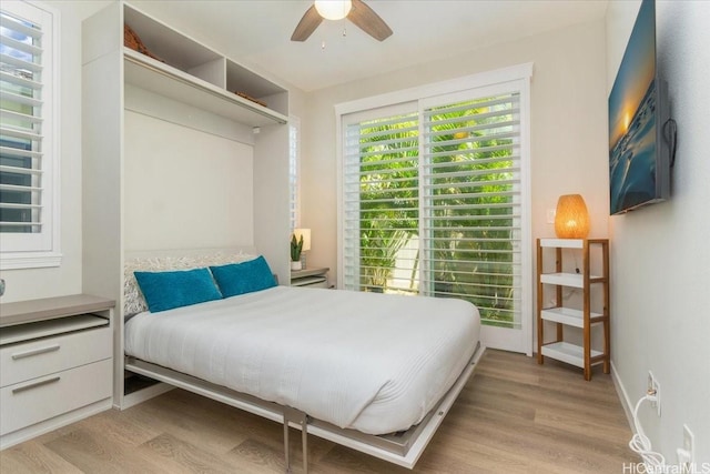 520 Lunalilo Home Rd Unit 354, Honolulu, HI 96825 - bedroom featuring light wood-type flooring and a ceiling fan