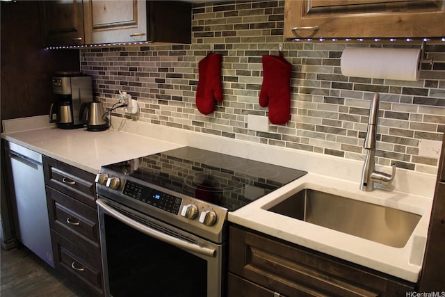 425 Ena Rd Unit 407B, Honolulu, HI 96815 - kitchen featuring electric range, backsplash, and light countertops