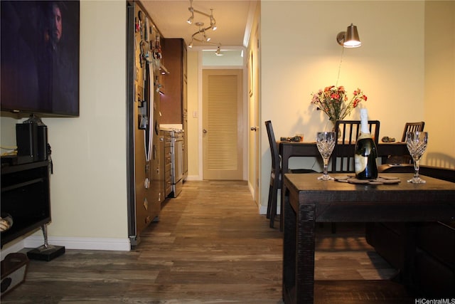 425 Ena Rd Unit 407B, Honolulu, HI 96815 - dining space featuring wood finished floors and rail lighting