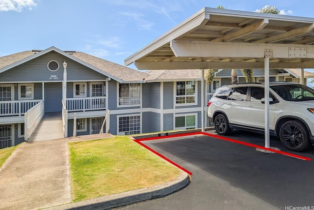 92-1005 Nou St Unit 5103, Kapolei, HI 96707 - view of building exterior with covered parking