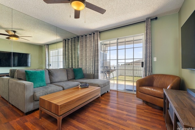 92-1005 Nou St Unit 5103, Kapolei, HI 96707 - living room featuring ceiling fan, a textured ceiling, and wood finished floors