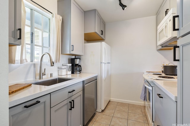 92-1005 Nou St Unit 5103, Kapolei, HI 96707 - kitchen featuring white appliances, light countertops, gray cabinets, and light tile patterned floors