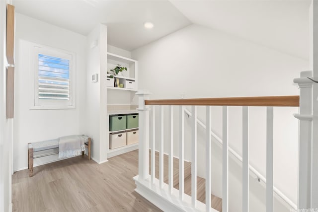 91-3633 Kauluakoko St Unit 1004, Ewa Beach, HI 96706 - hallway featuring light wood finished floors and vaulted ceiling