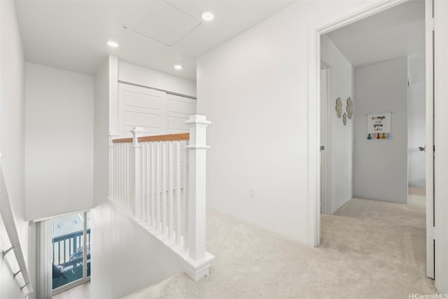 91-3633 Kauluakoko St Unit 1004, Ewa Beach, HI 96706 - hallway with carpet floors, recessed lighting, and an upstairs landing
