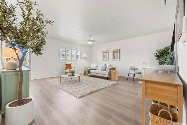 91-3633 Kauluakoko St Unit 1004, Ewa Beach, HI 96706 - living room with ceiling fan and light wood-style flooring