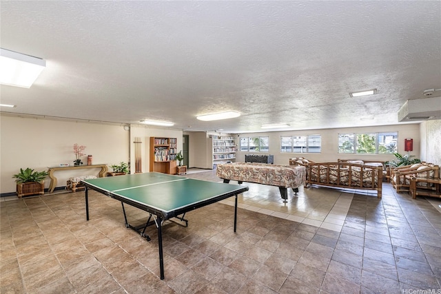 2211 Ala Wai Blvd Unit 3201, Honolulu, HI 96815 - rec room with a textured ceiling