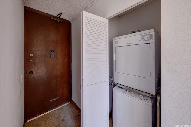 2754 Kuilei St Unit 702, Honolulu, HI 96826 - washroom featuring stacked washer / dryer, carpet floors, and a textured ceiling