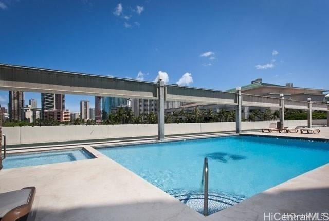 1750 Kalakaua Ave Unit 1507, Honolulu, HI 96826 - community pool with a patio area