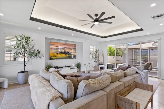 91-1298 Kuanoo St, Ewa Beach, HI 96706 - living area featuring a tray ceiling, ceiling fan, and recessed lighting