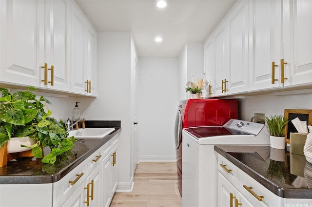 91-1298 Kuanoo St, Ewa Beach, HI 96706 - washroom with washing machine and dryer, recessed lighting, and cabinet space