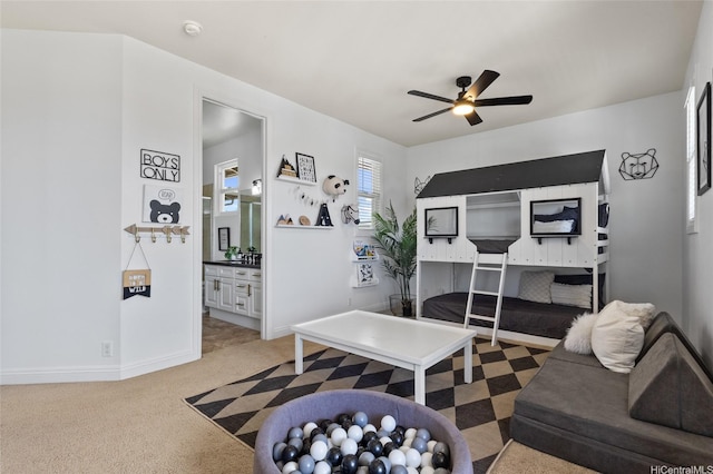 91-1298 Kuanoo St, Ewa Beach, HI 96706 - living room with ceiling fan and light carpet