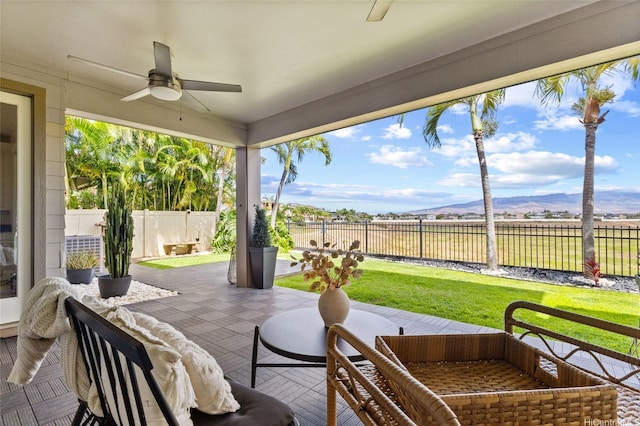 91-1298 Kuanoo St, Ewa Beach, HI 96706 - fenced backyard with a ceiling fan, a mountain view, and a patio
