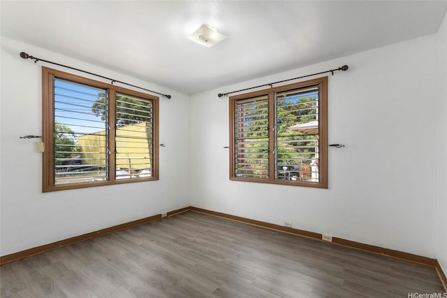 84-570 Farrington Hwy Unit D, Waianae, HI 96792 - spare room featuring wood finished floors and baseboards