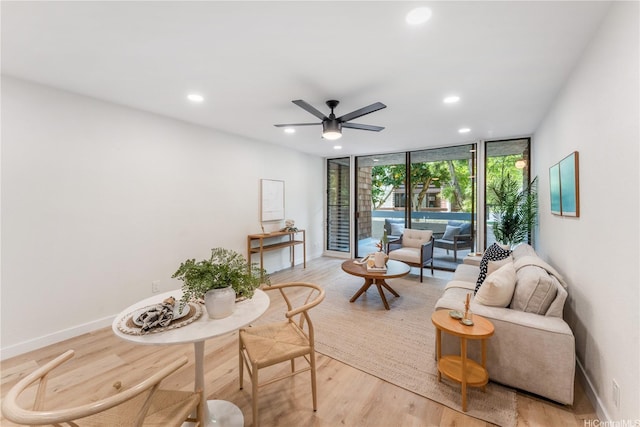 333 Aoloa St Unit 214, Kailua, HI 96734 - living area with floor to ceiling windows, recessed lighting, light wood-style floors, and a ceiling fan