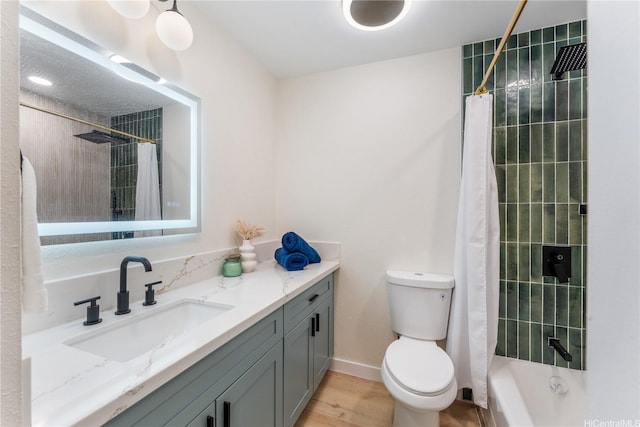 333 Aoloa St Unit 214, Kailua, HI 96734 - bathroom featuring vanity, wood finished floors, and shower / bath combination with curtain