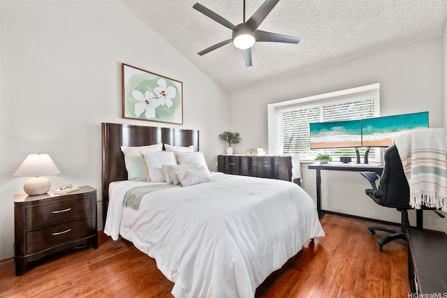 46-036 Aliikane Pl Unit 522, Kaneohe, HI 96744 - bedroom with a textured ceiling, lofted ceiling, wood finished floors, and ceiling fan