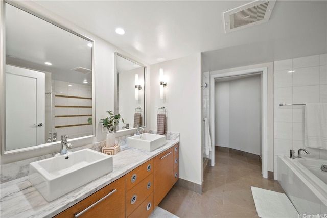 1177 Queen St Unit 4104, Honolulu, HI 96814 - full bathroom featuring double vanity, a tub to relax in, recessed lighting, and tile patterned flooring