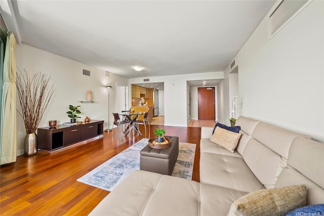 1177 Queen St Unit 4104, Honolulu, HI 96814 - living area featuring wood finished floors